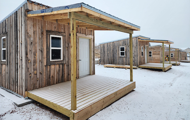 Row of new cabins in winter